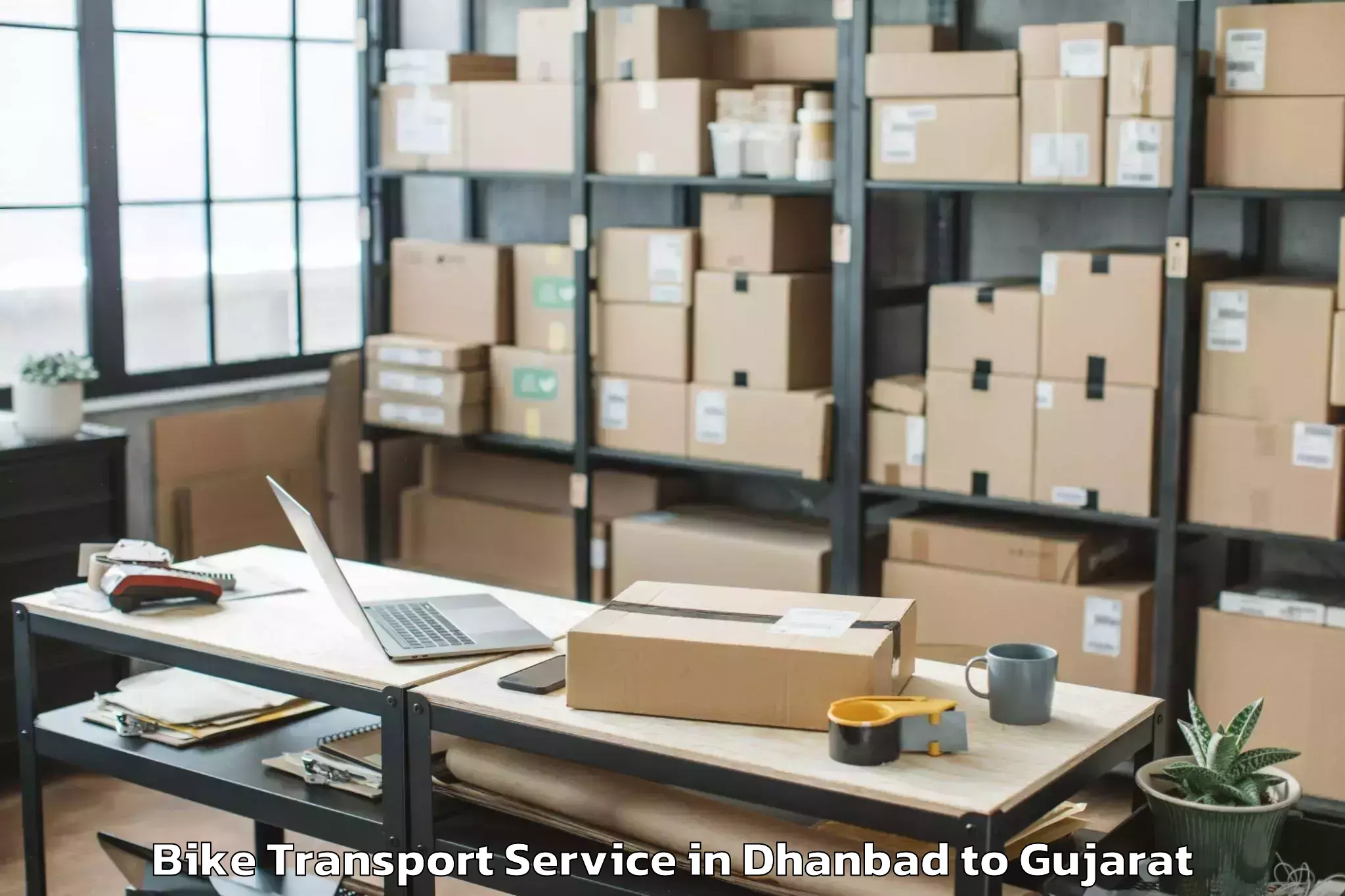 Professional Dhanbad to Rajkot Bike Transport